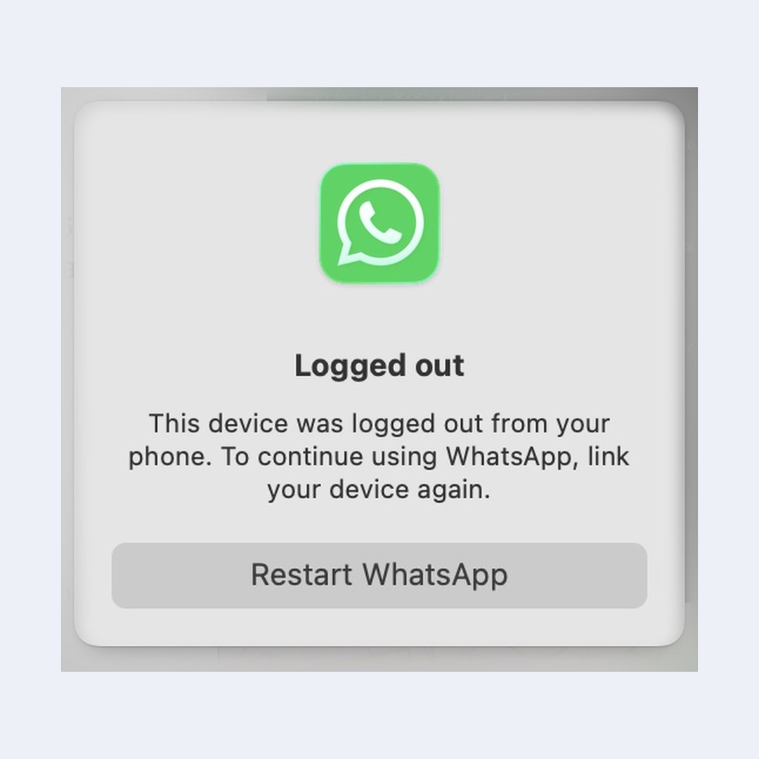 WhatsApp Desktop for Mac showing the Logged out modal over a blurred chat list, with a Restart WhatsApp button